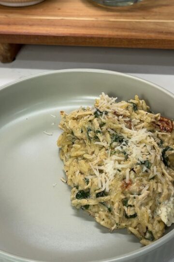 marry me chicken orzo casserole on green dinner plate