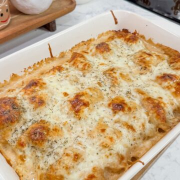 chicken alfredo rollups in casserole dish