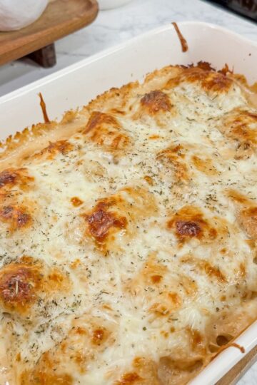 chicken alfredo rollups in casserole dish