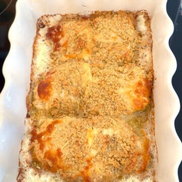 easy one pan chicken caesar bake in white baking dish