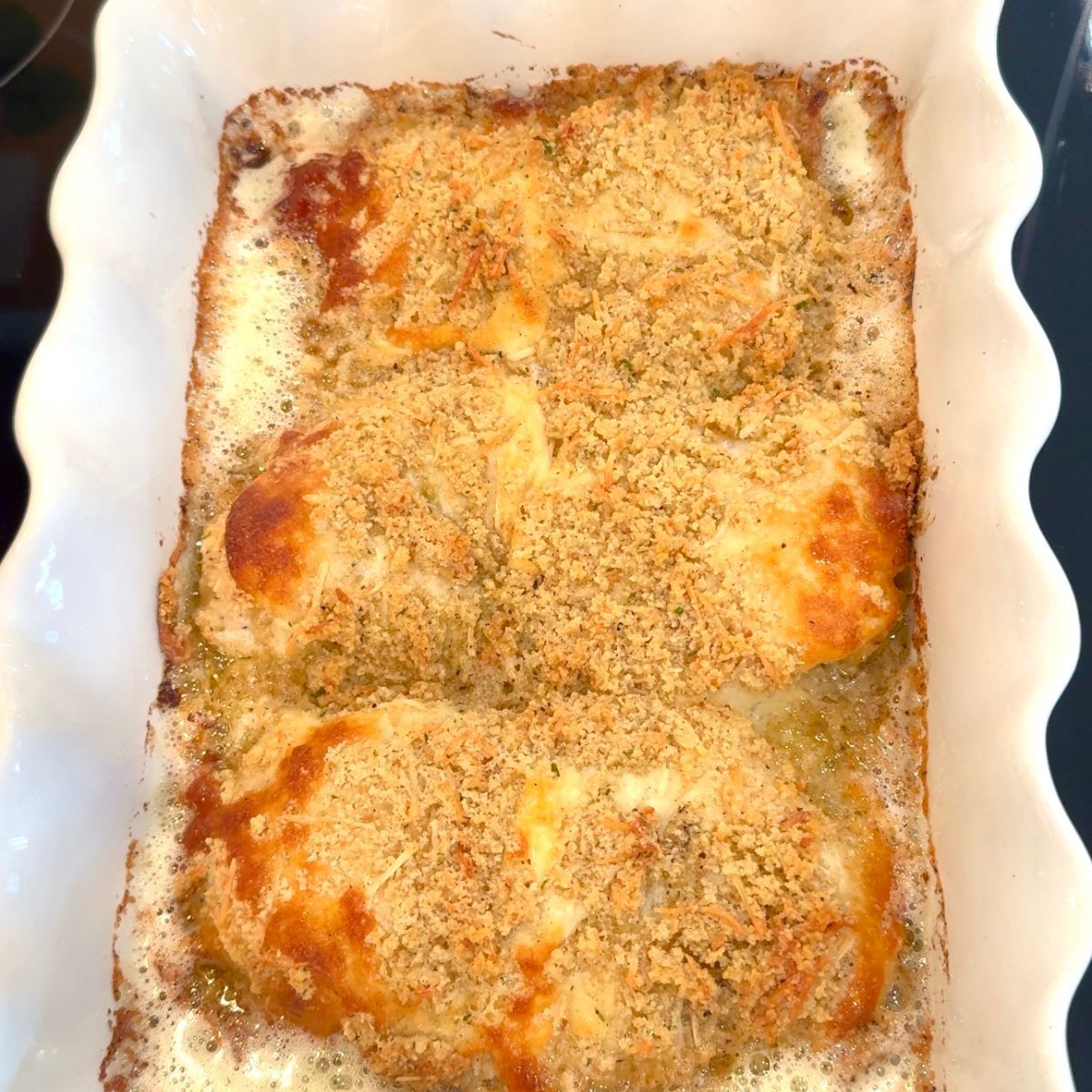 easy one pan chicken caesar bake in white baking dish