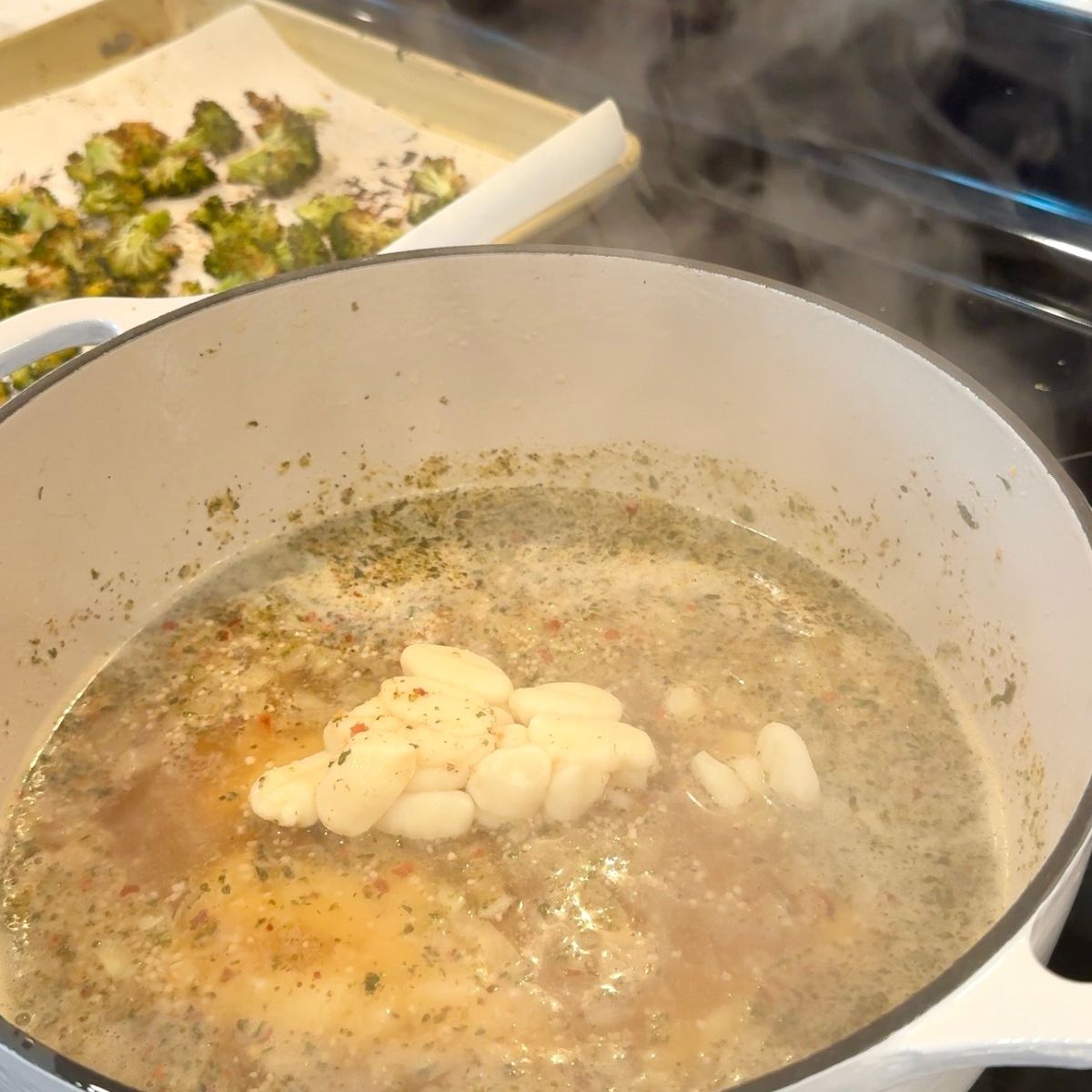 gnocchi pasta added to to large pot for soup