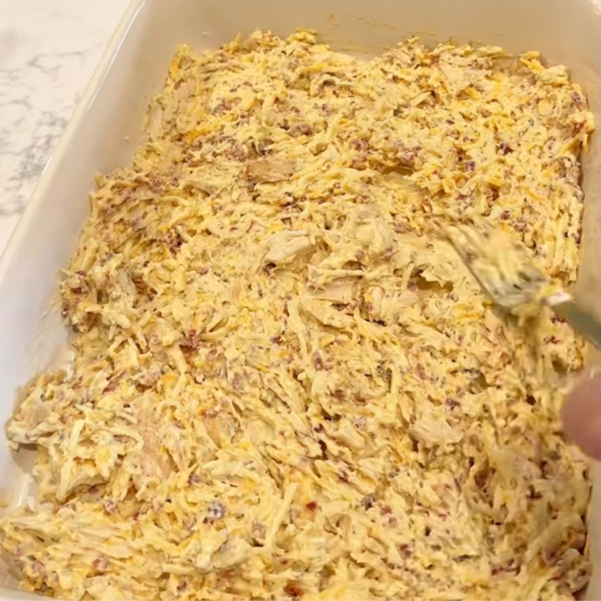 easy dinner chicken casserole spread on 13x9 pan