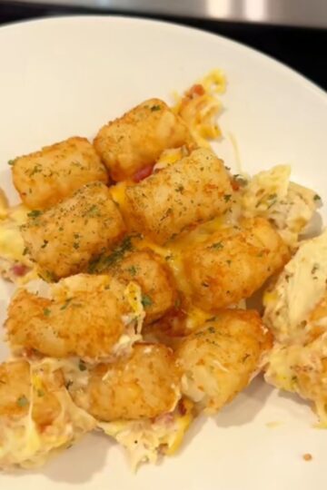 chicken bacon ranch tater tot casserole on cream plate