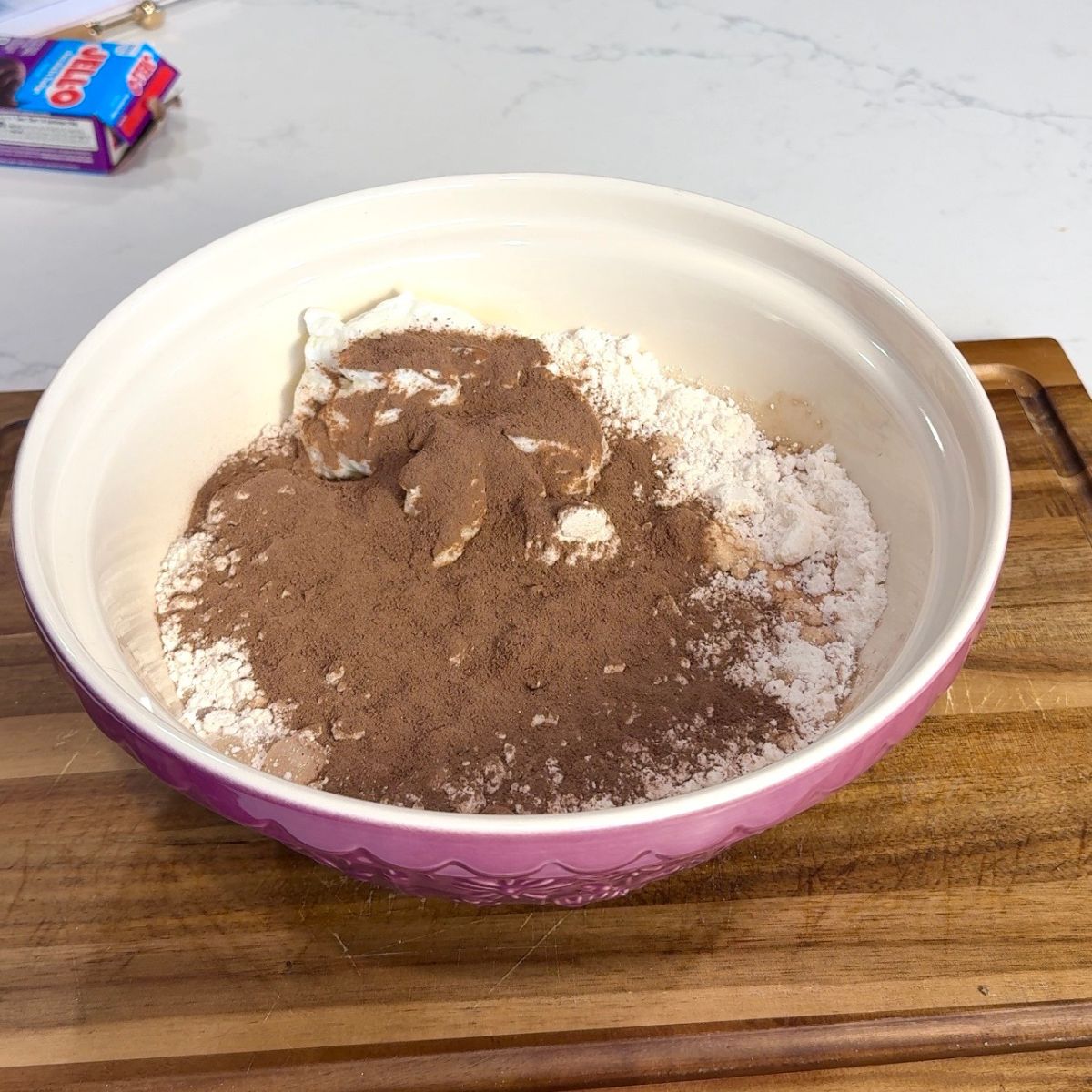 all chocolate muffin ingredients added into the bowl not mixed together