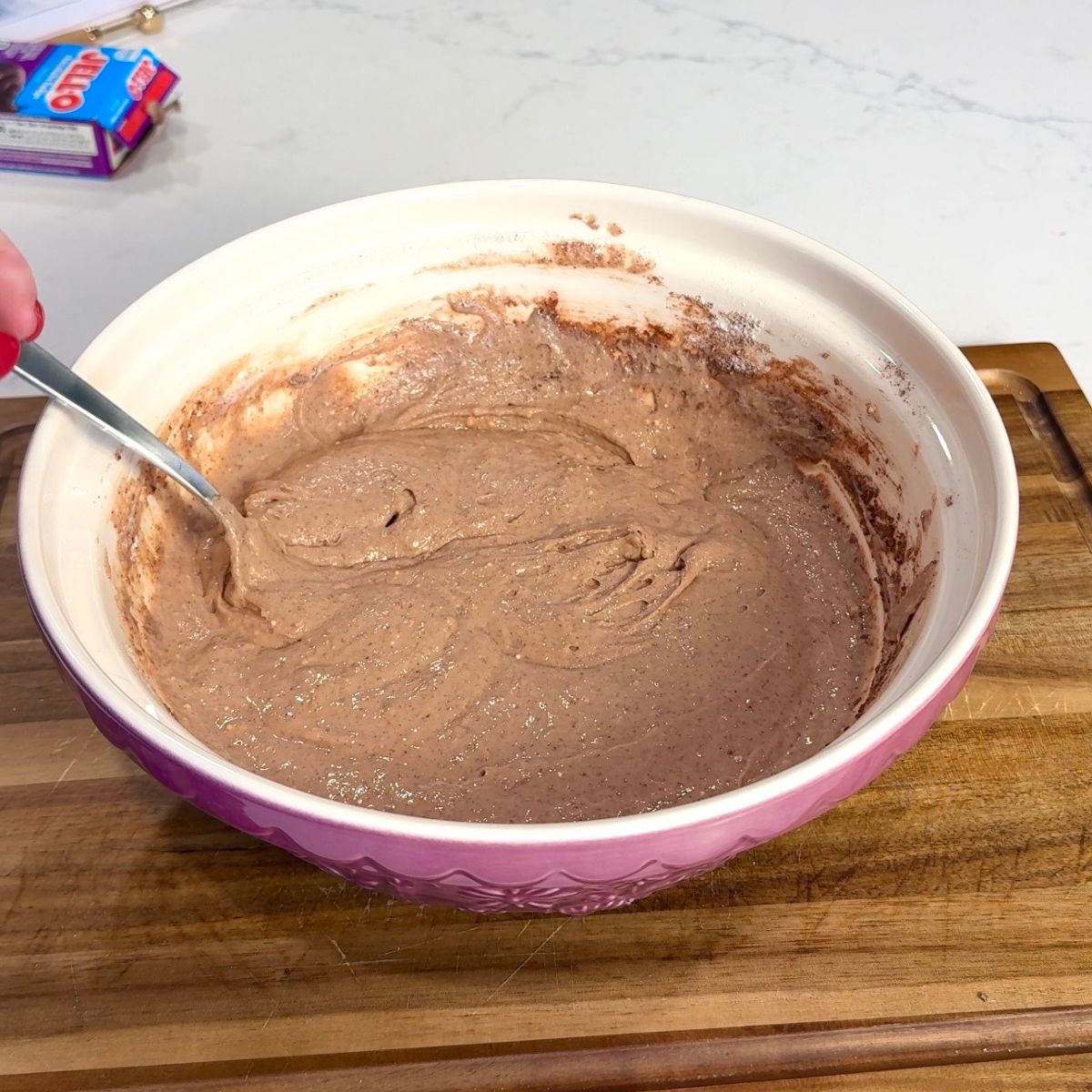all recipe ingredients mixed together in pink bowl