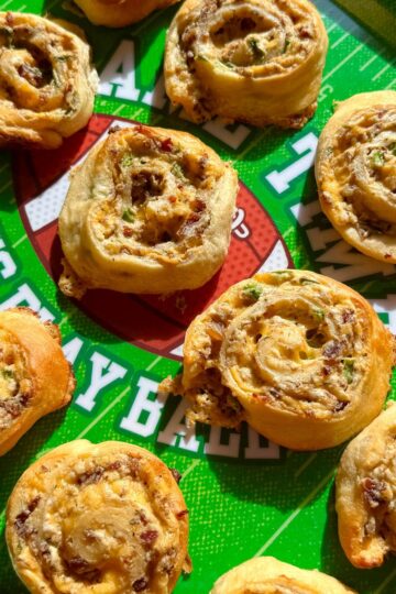 jalapeno popper pinwheels on green tray