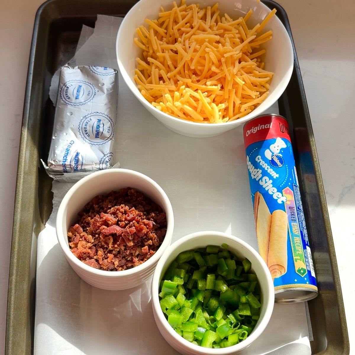 cheese, bacon, jalapenos, crescent dough ingredients on tray