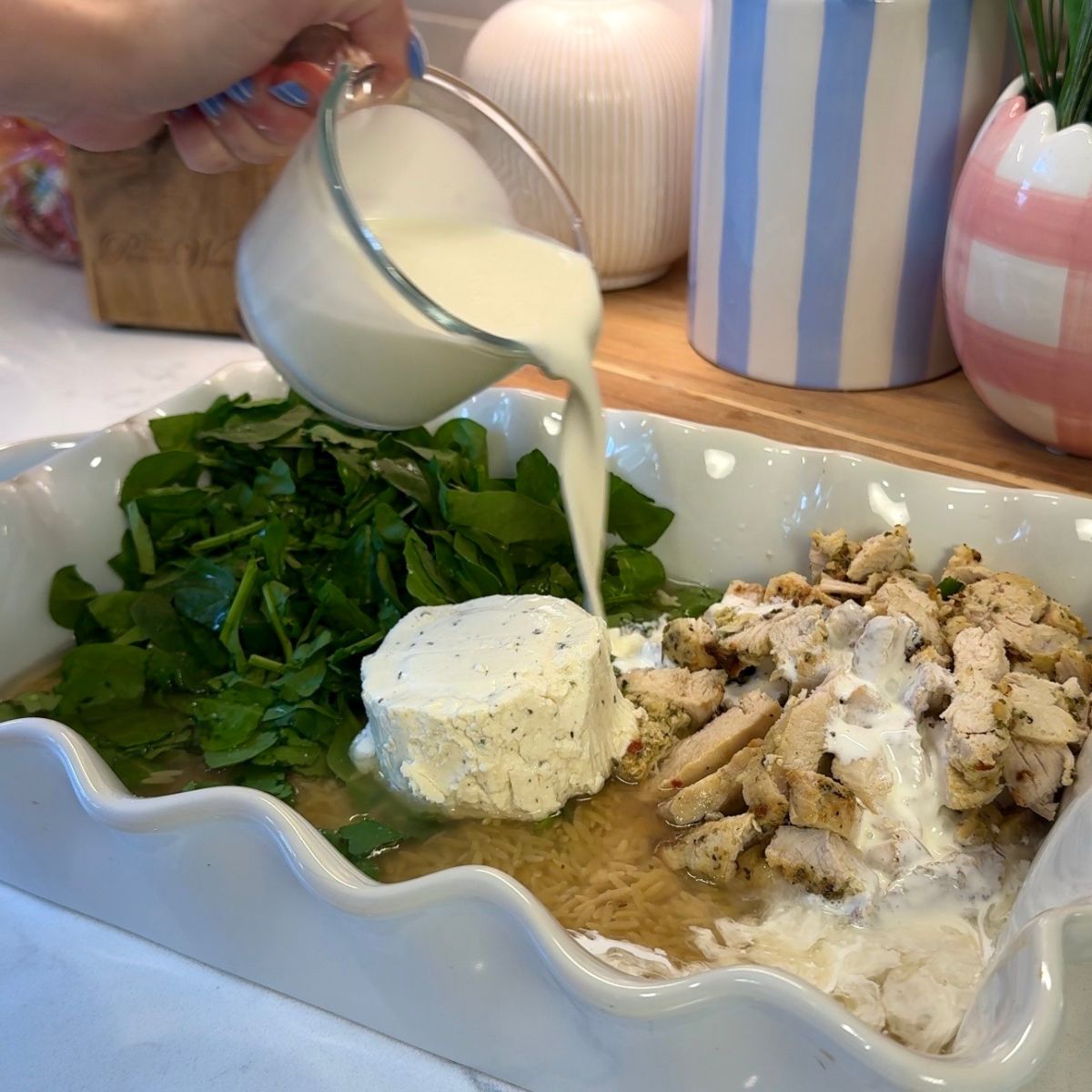 heavy cream poured into casserole dish