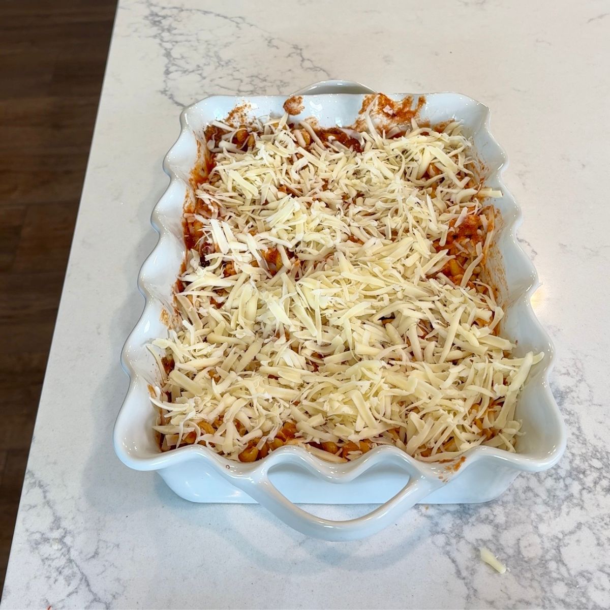 additional layer of cheese on top of pasta 