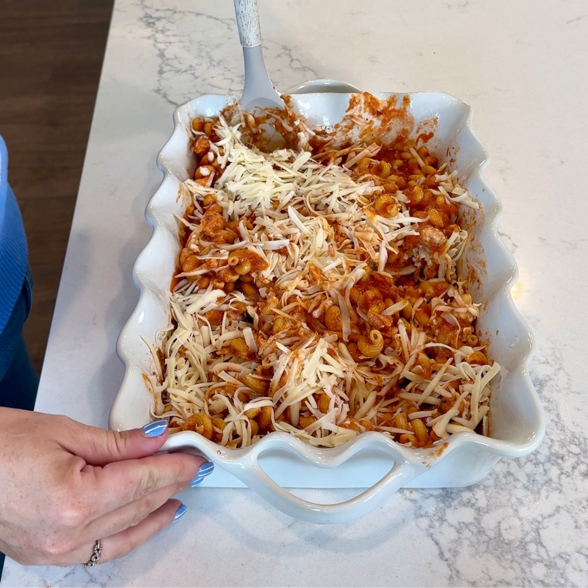 cheese mixed into pizza pasta casserole