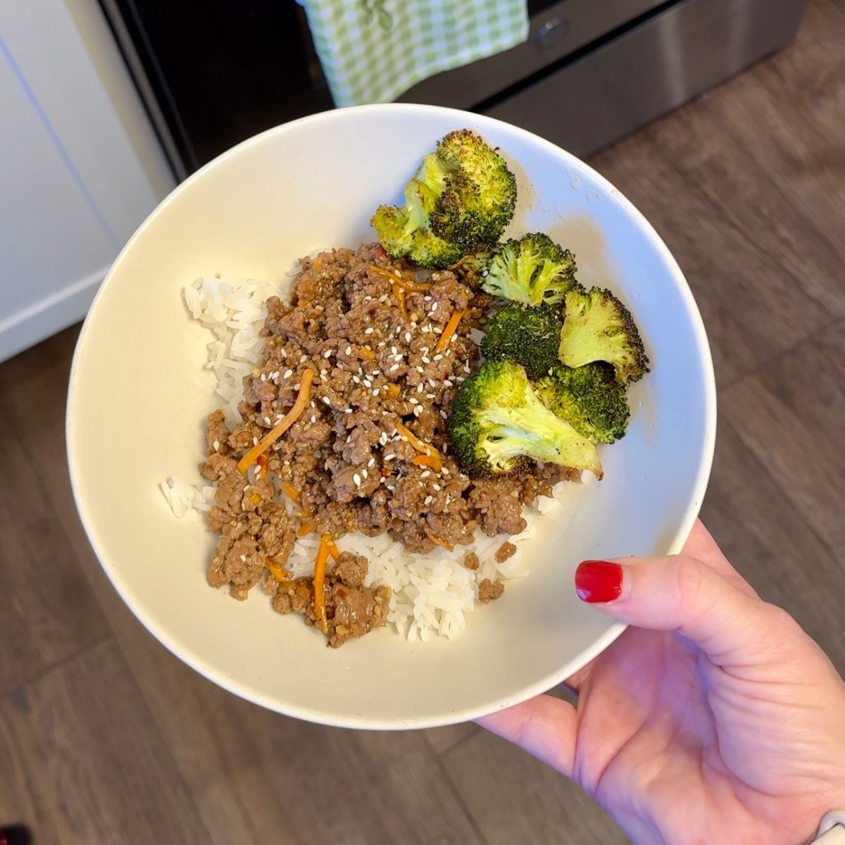 mongolian beef bowls with broccoli, rice in bowl