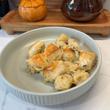 chicken alfredo biscuit bake on green plate
