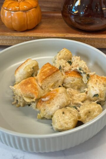 chicken alfredo biscuit bake on green plate