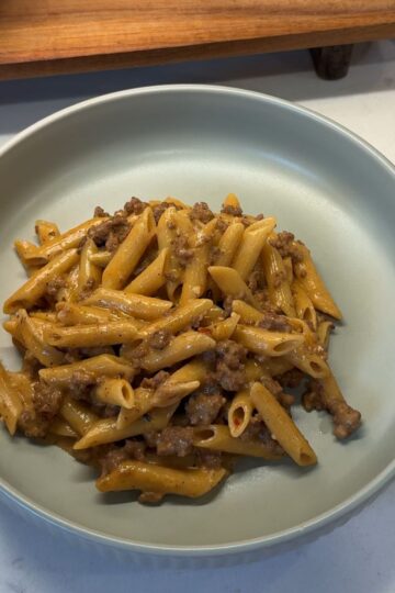 cowboy butter beef pasta on green plate