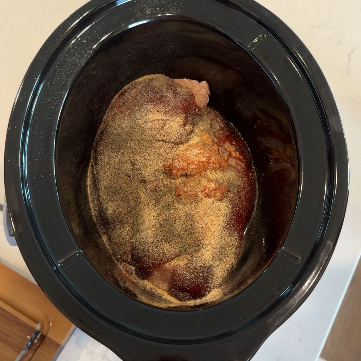 seasonings added on chicken with sauce