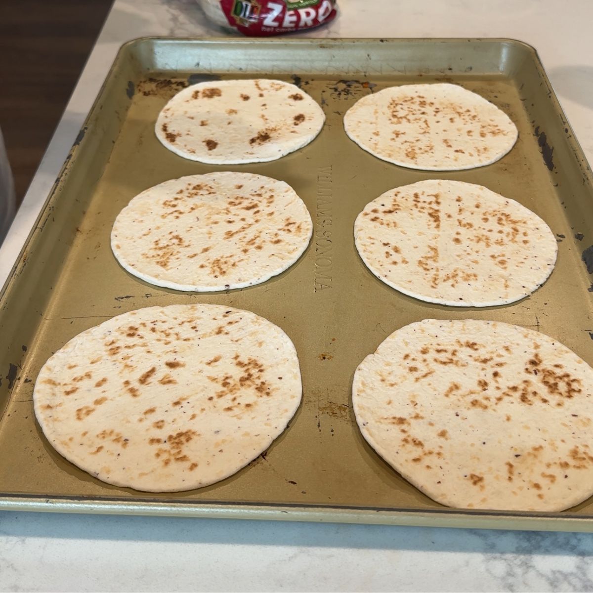 6 tortillas on baking tray