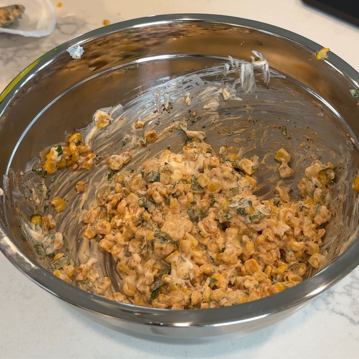 street corn salsa mixed together in bowl