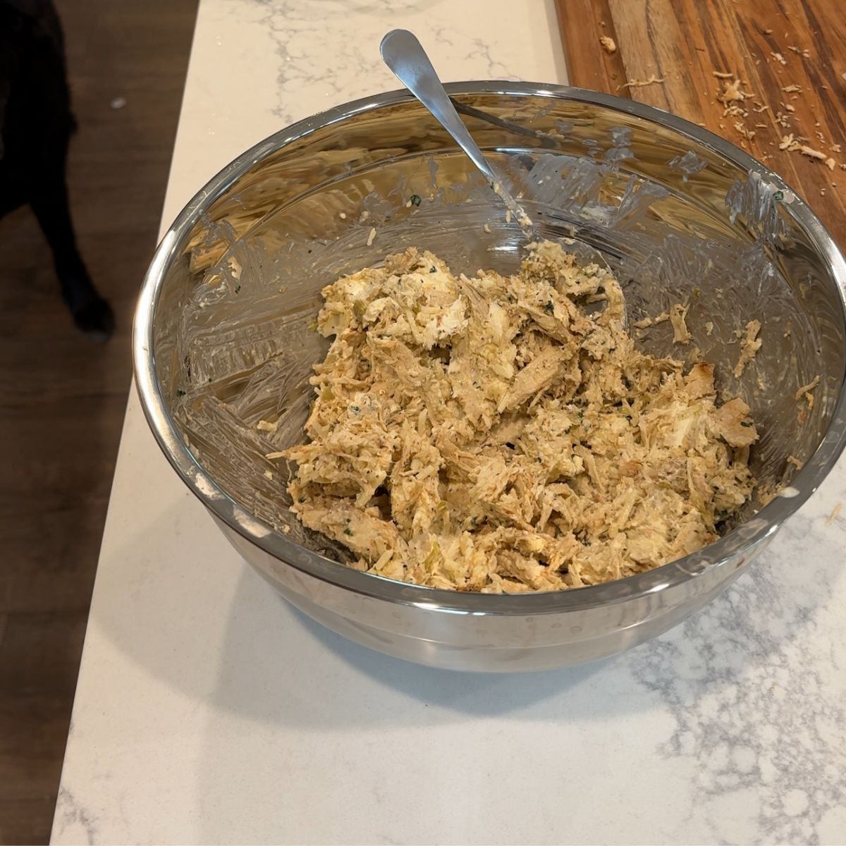 chicken and cream cheese mixture in bowl with spoon