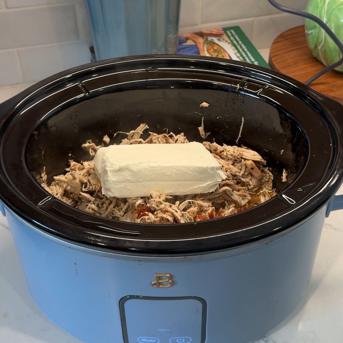 cream cheese over chicken in crockpot