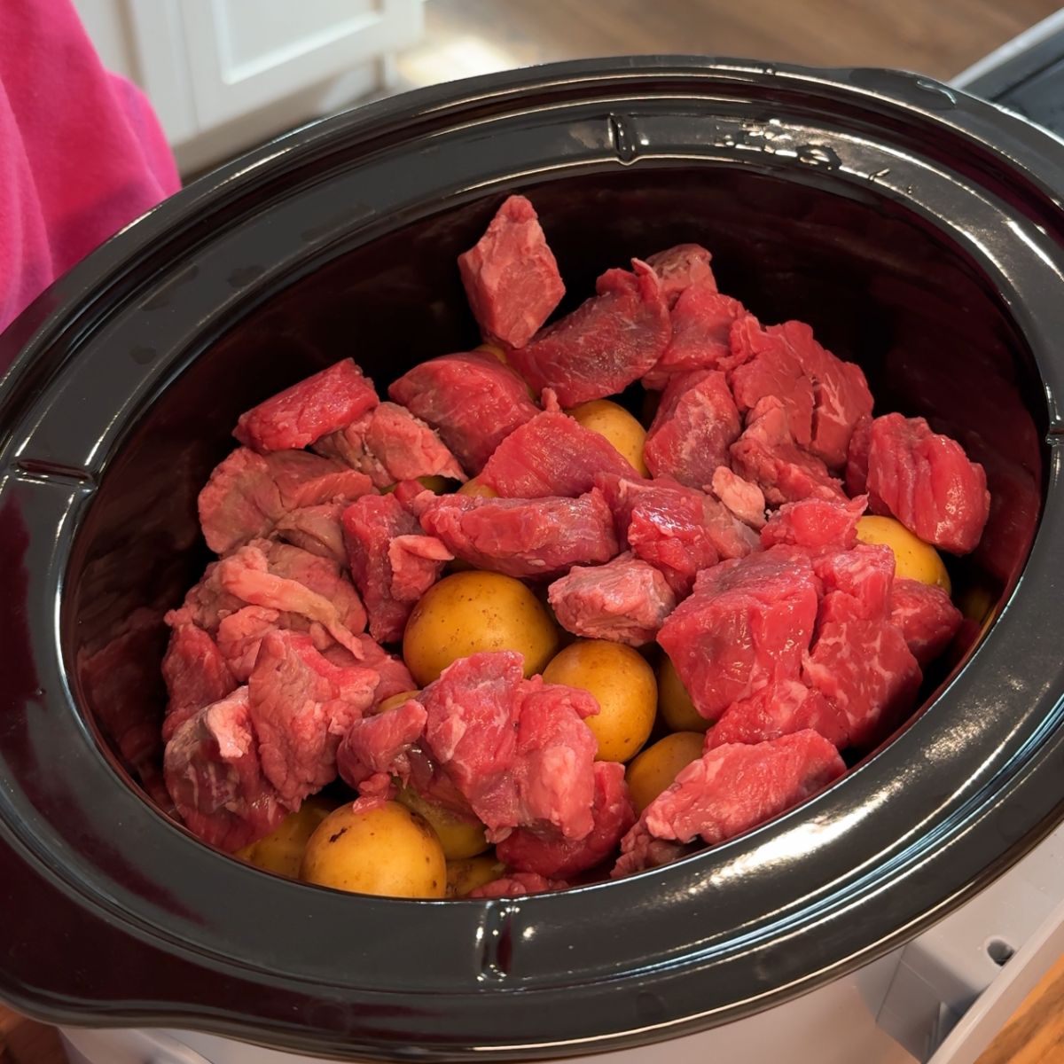 meat and potatoes in slow cooker