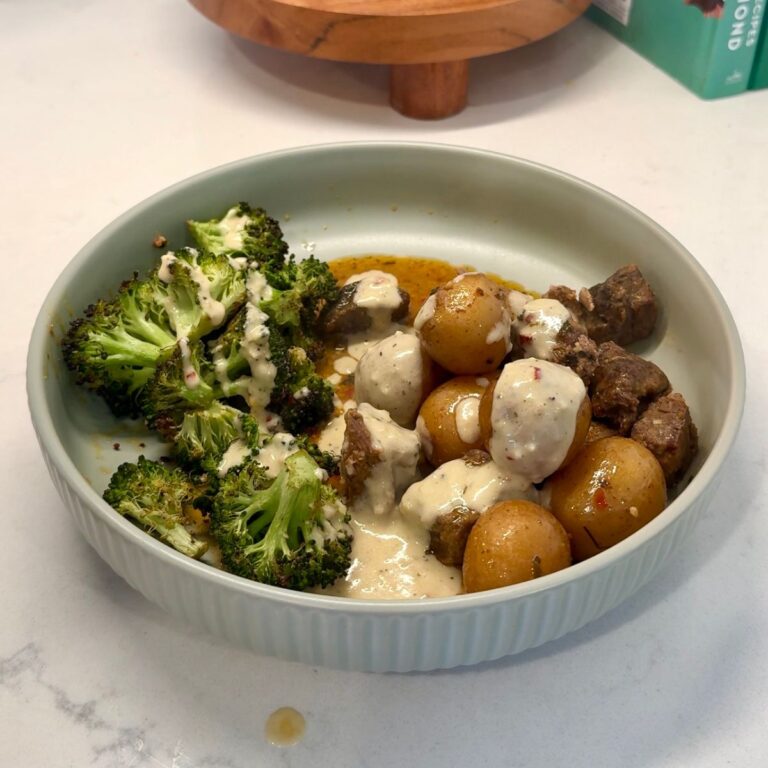 crockpot cowboy butter steak bites with broccoli and cream sauce