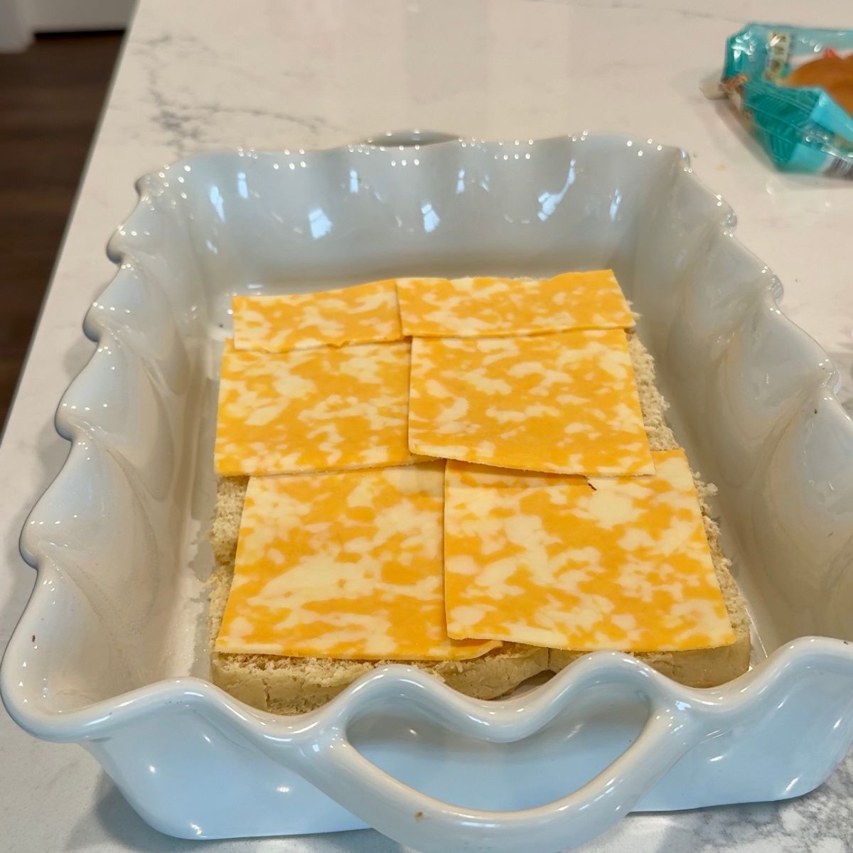 cheese on top of bread on baking tray