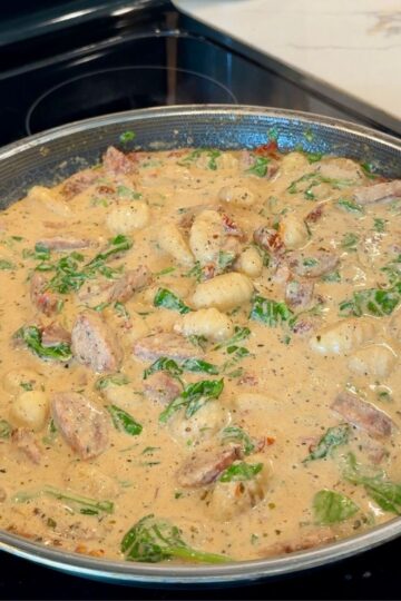 creamy marry me sausage gnocchi in large skillet