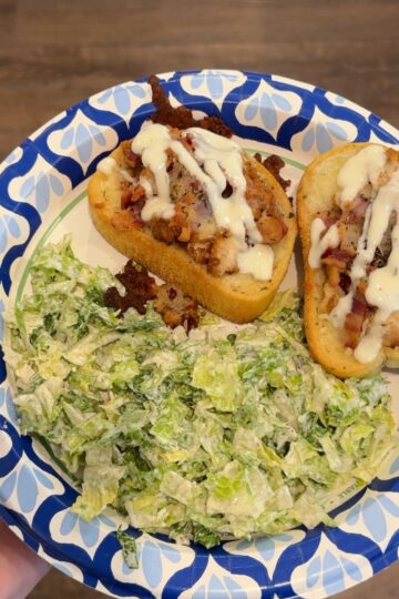 2 chicken bacon texas toast and salad on paper plate