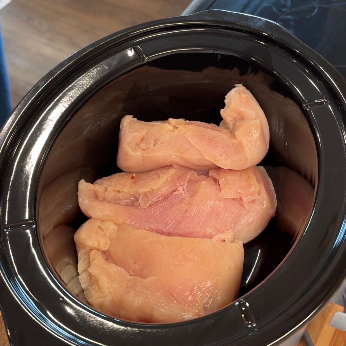 3 raw chicken breasts in slow cooker