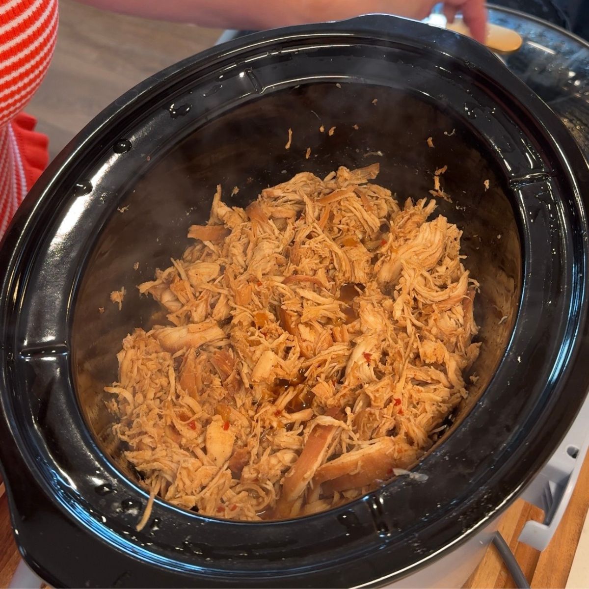 cooked shredded chicken in crockpot