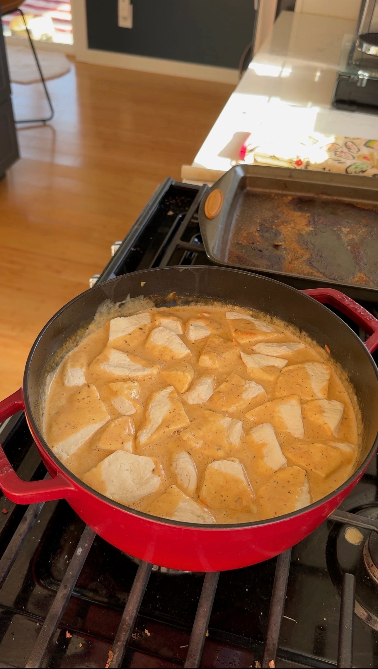 Diced chicken, carrots, and bacon simmering in ranch seasoned broth.